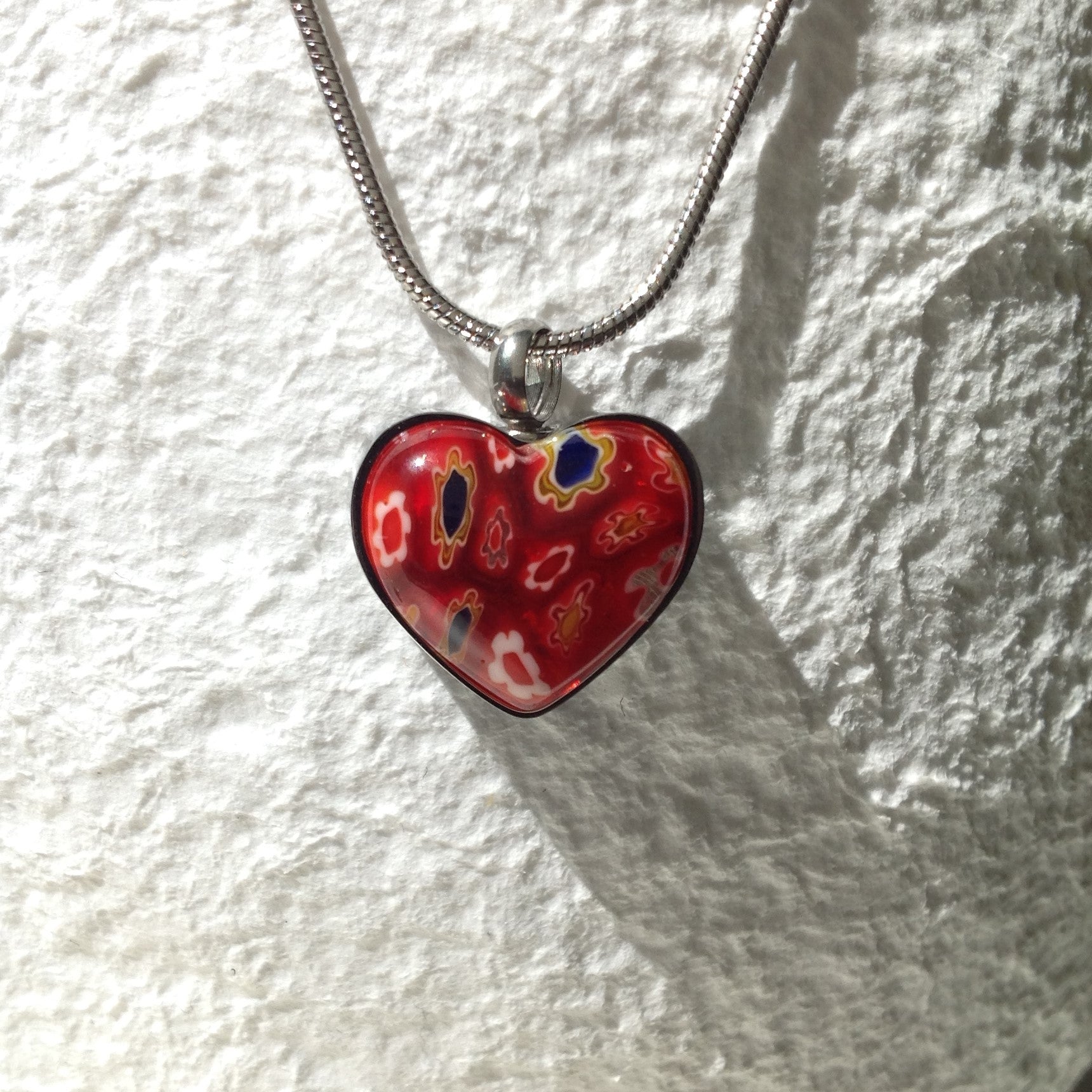Picture of a Stainless Steel  cremation jewelry with a Heart pendant for ashes